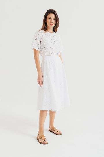 Rupičasta bela suknja