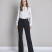Crne pantalone blago zvonastog kroja